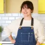 Photo of Palate Recipe author Emily Carter looking excited, standing in a kitchen